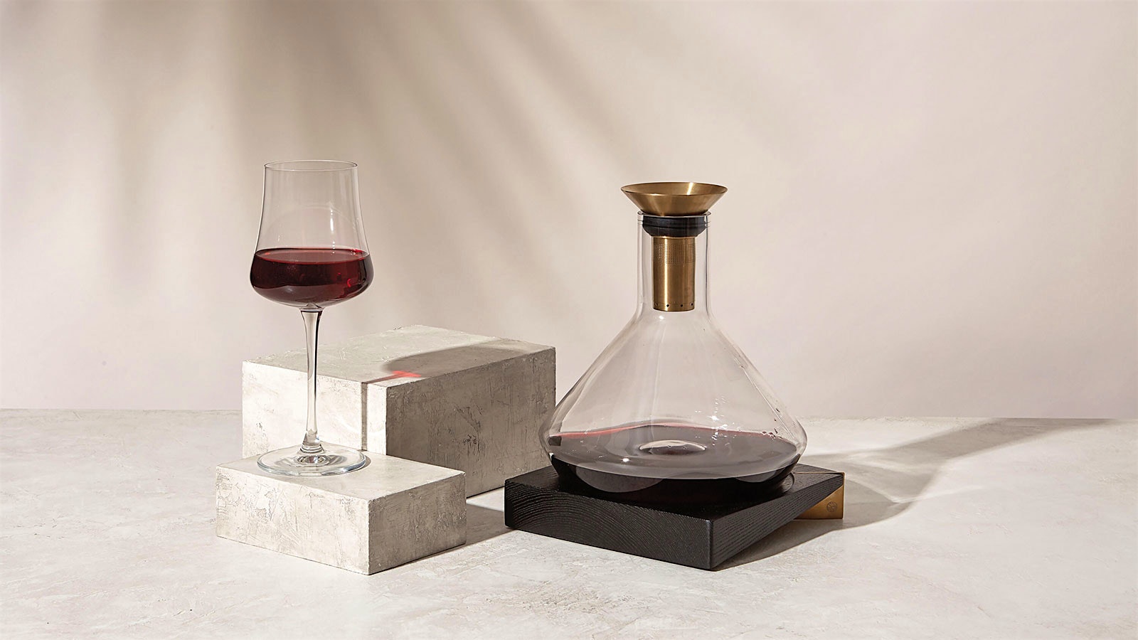 RBT’s Flask-Style Decanter next to a glass of red wine